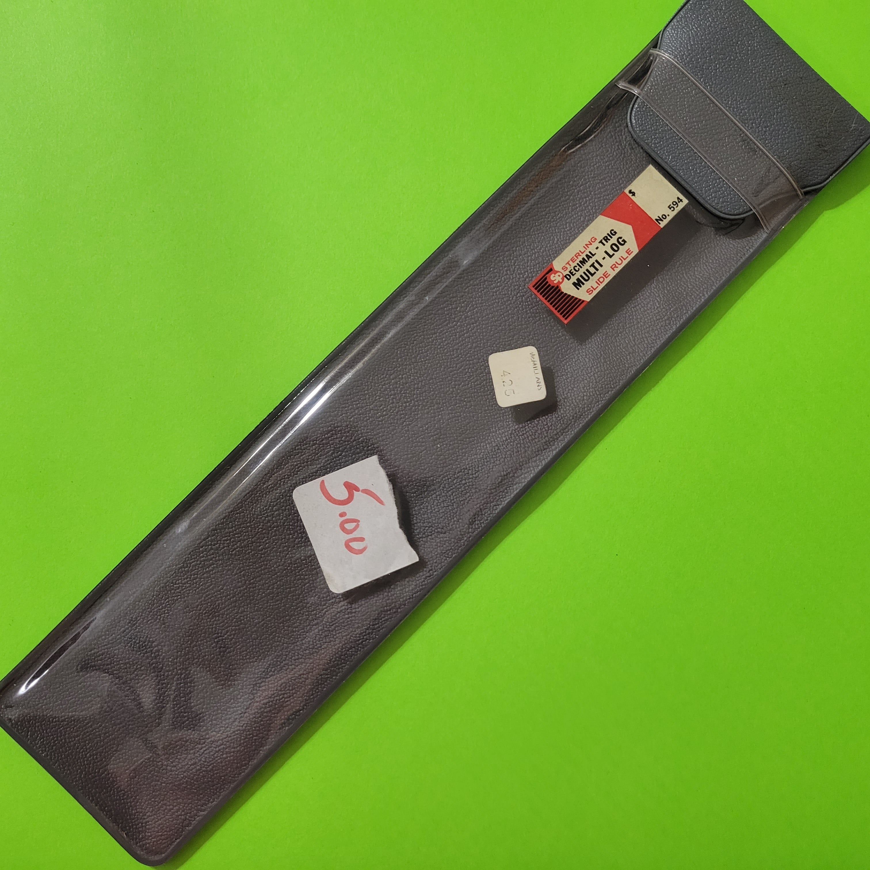 An image of the case of a Sterling Decimal Trig Multi-Log Slide Rule No.594 slide rule